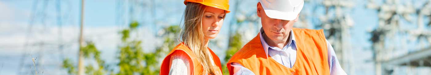 female, male construction workers on construction site
